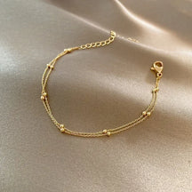 Pulsera Doble Encanto Dorado